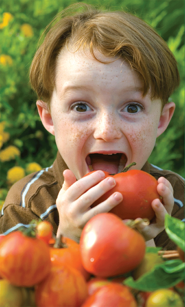 Healthy Bodies. Happy Kids. Child eating apple