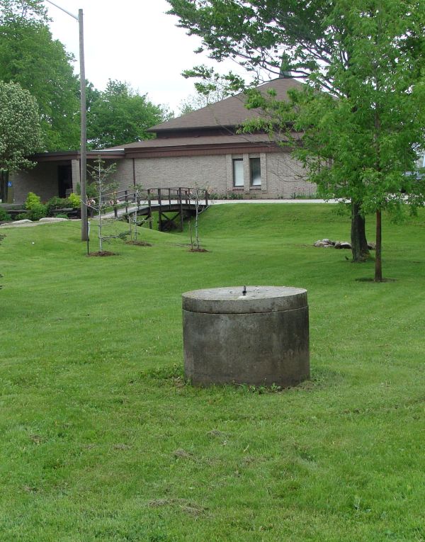 A picture of a well at a church