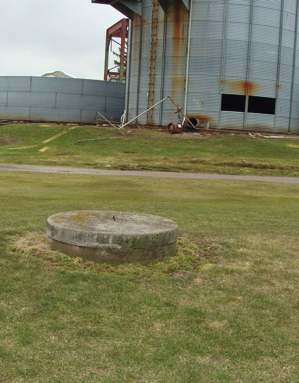 A picture of a well at a farm