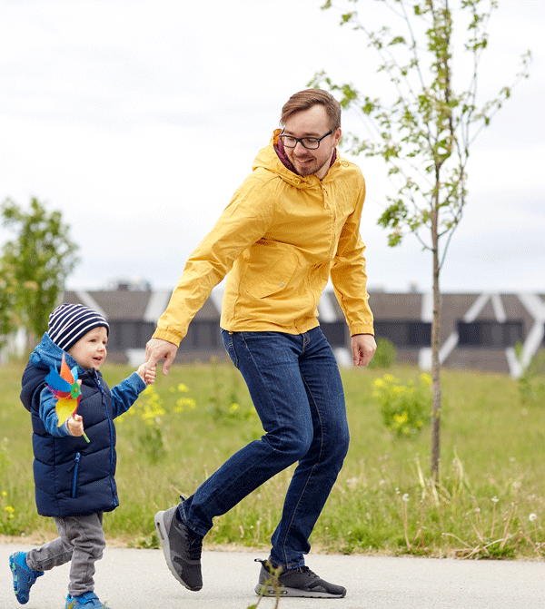 Father holding sons hand