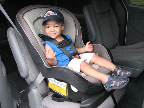 Front facing kids too early is a common violation of car seat regulations. 