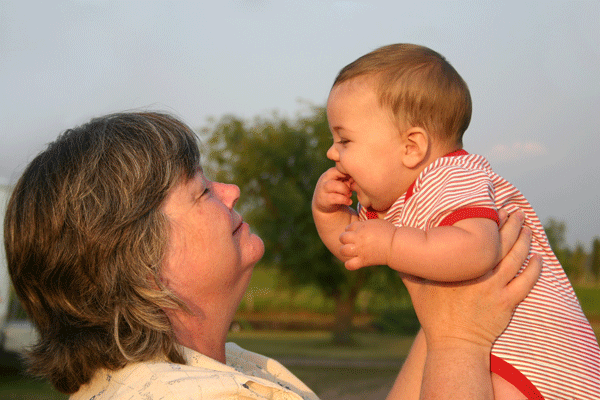 Supportive and Stable Relationship with Caregiver Grandmother and Baby playing together