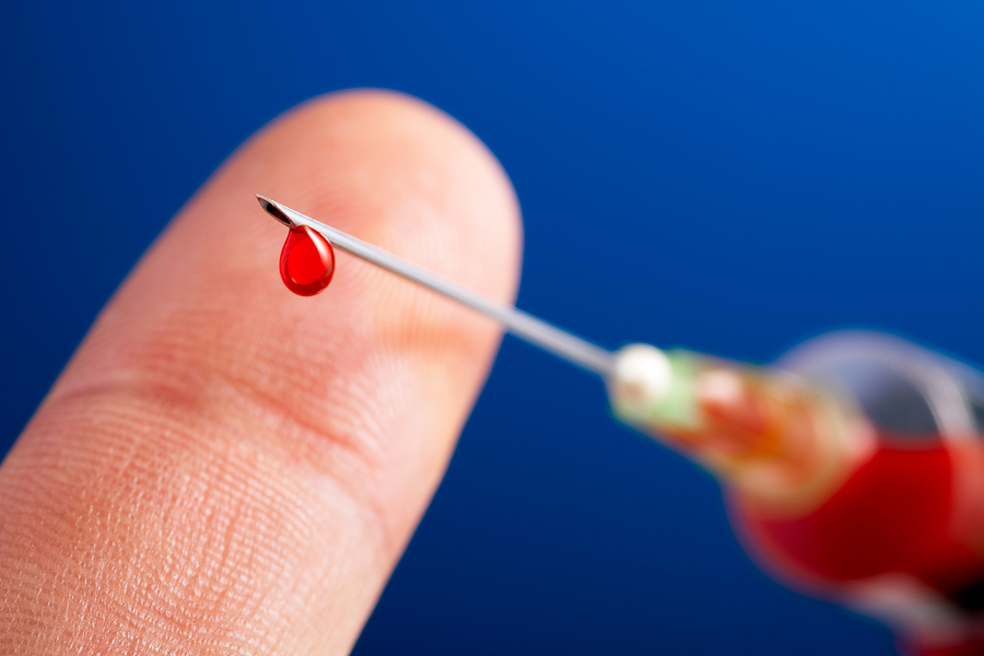 Needle With Droplet of Blood