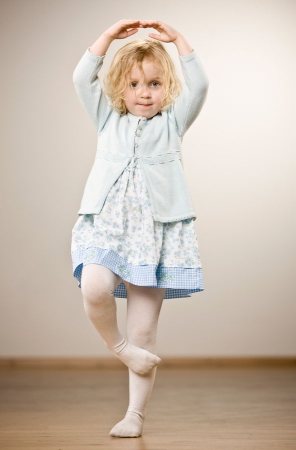 Child standing on one foot