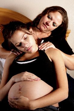 Pregnant women getting massage