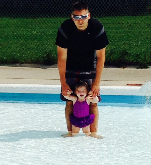 Wading Pool A father and baby in a wading pool
